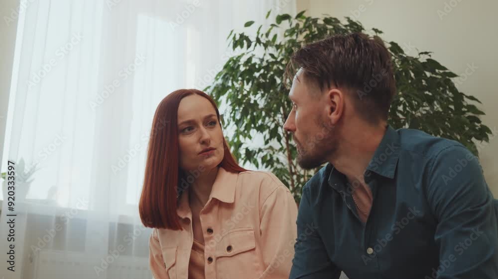 Low angle Couple engaged in intense discussion during therapy. Concept therapy communication conflict resolution support mental health Low angle Couple engaged in intense discussion during therapy. Concept therapy communication conflict resolution support mental health