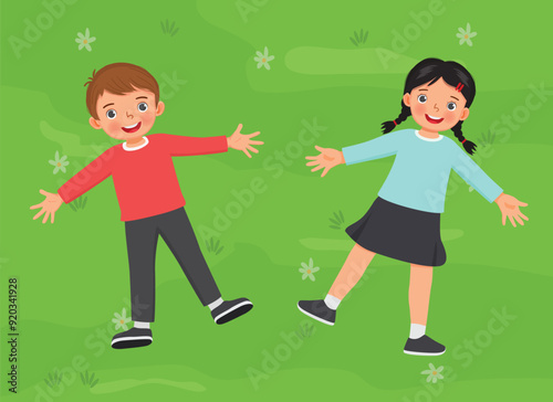 Cute little kids boy and girl lying on the green grass field together