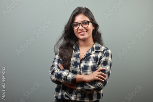 Smiling portrait of a young woman of Indian ethnicity