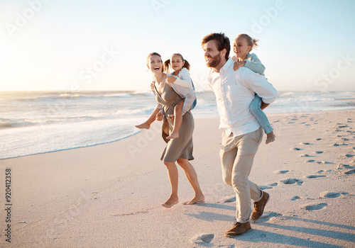 Happy, family and piggyback with children at beach for outdoor adventure, vacation and weekend trip. Sunset, father and mother with kids by ocean in summer for fun holiday, love and travel in Florida photo