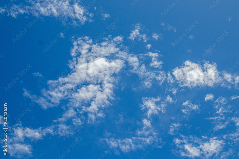 a serene background image of a bright sky with clouds, perfect for a good weather day. a serene background image of a bright sky with clouds, perfect for a good weather day.
