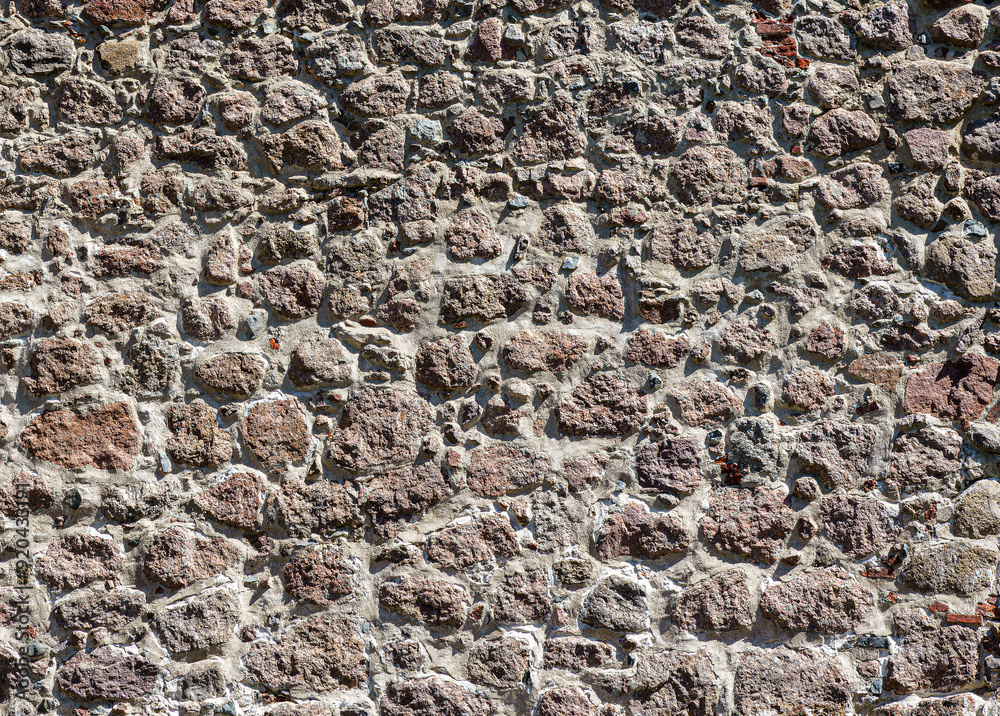 Texture of an old antique stone wall. Background for design. Texture of an old antique stone wall. Background for design.