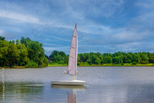 Sailboats moored in the white pier, daytime, clear weather, water sports