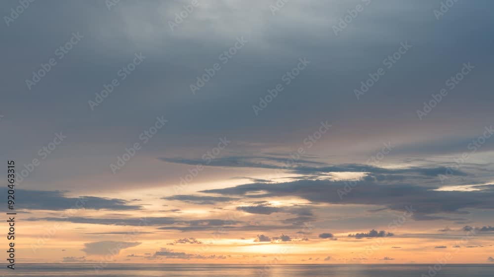 Ocean panorama. Dark orange clouds day to night sky. Dramatic sunset over storm clouds. Beautiful red color sky. Red purple orange blue pink sunset cloud background. Concept holiday in the tropics.