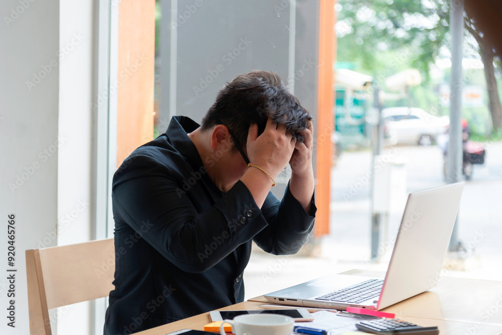 young asian businessman in panic in a office and Stressed about work young asian businessman in panic in a office and Stressed about work