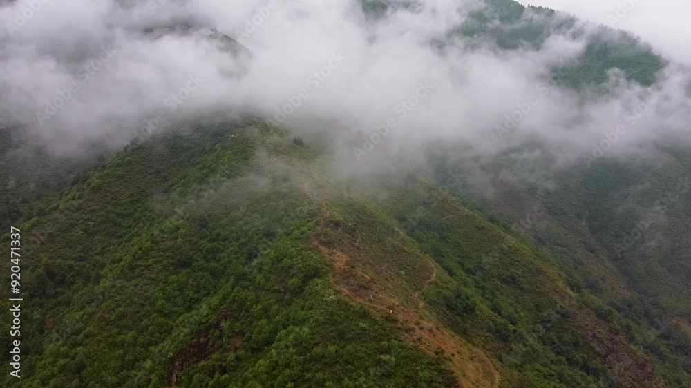 Aerial View of Lush Green Mountain Partially Covered by Clouds with Drizzle Near Mamneth, Kashmir Aerial View of Lush Green Mountain Partially Covered by Clouds with Drizzle Near Mamneth, Kashmir