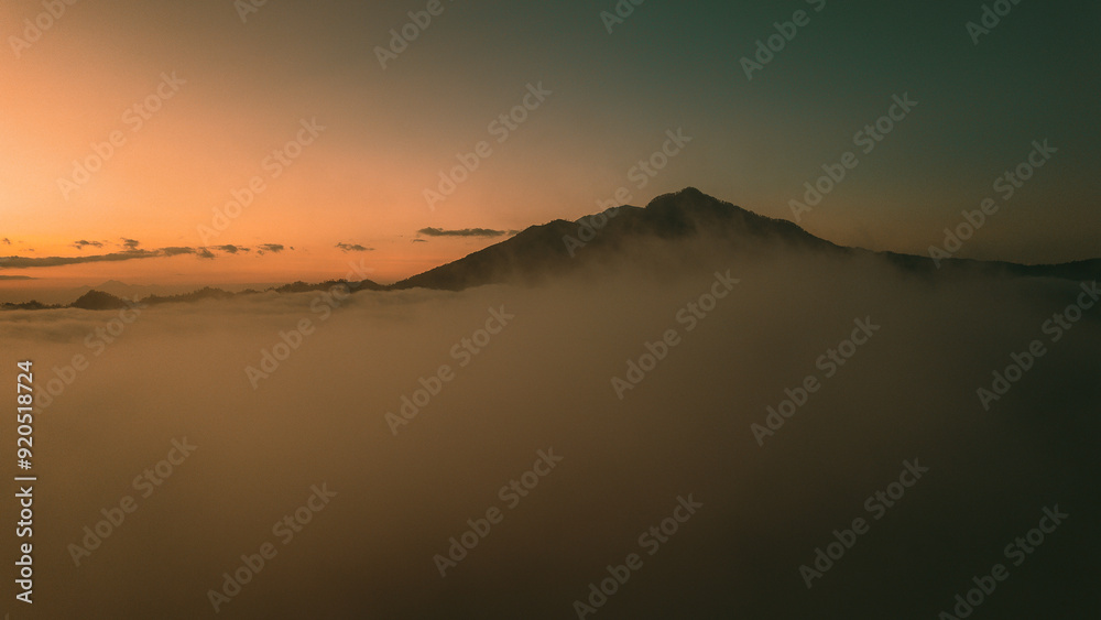 Spectacular Sunrise Over Mount Batur Volcano, Bali, Indonesia. Summer time. Drone 4k footage.