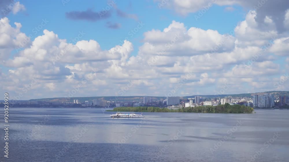 beautiful landscape of provincial town Saratov of Russia with Volga river and boat, top view beautiful landscape of provincial town Saratov of Russia with Volga river and boat, top view