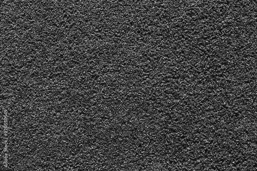 Black epdm flooring, where the material is shaped like sand but is soft and is commonly.