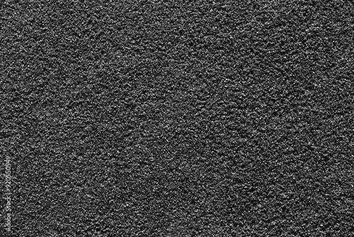 Obraz na płótnie Black epdm flooring, where the material is shaped like sand but is soft and is commonly. w salonie