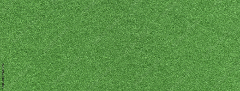 Texture of craft green paper background colors, macro. Structure of vintage kraft cardboard. Texture of craft green paper background colors, macro. Structure of vintage kraft cardboard.