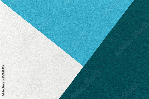 Texture of craft white, blue and teal shade color paper background, macro. Vintage abstract emerald cardboard