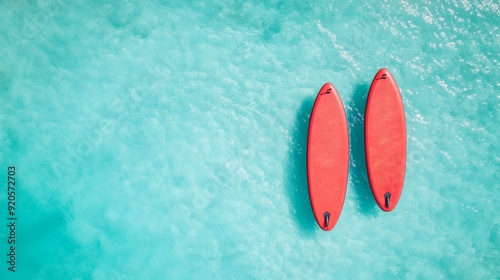 Two supboards on the water top view photo