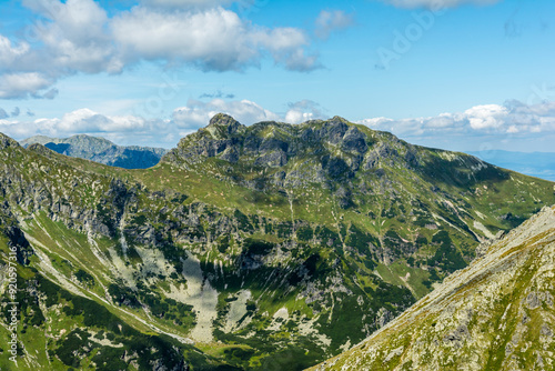 A view of a mountain peak on a beautiful summer day - Szeroka Jaworzynska (Javorinská Siroka, Siroka), in the high tatras in slovakia. photo