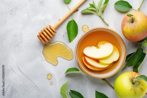 Top view of sliced green apples soaked in honey, with a wooden dipper in a rustic bowl, surrounded by apple leaves, symbolizing the Rosh Hashanah tradition on a white background. ai