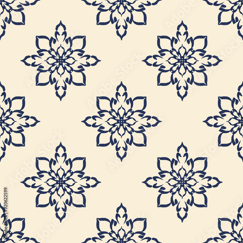 Classic damask pattern floral and petals detail a star like shape.
