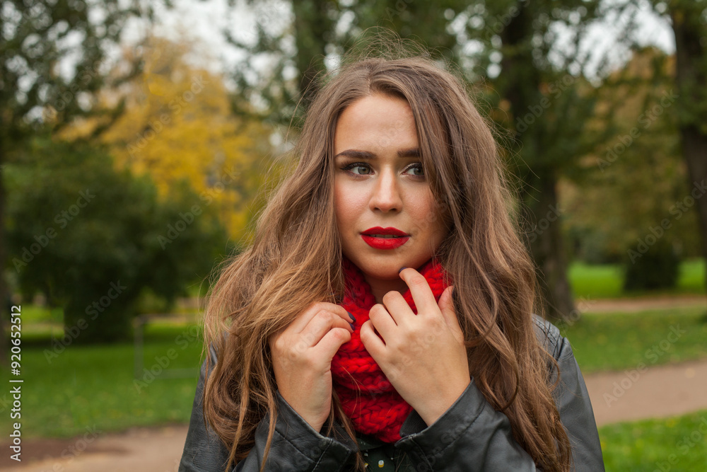 Cheerful autumn woman in fall park, outdoor portrait