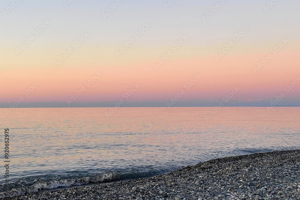 Tranquil nature background. Pastel pink and blue color sea and sky Tranquil nature background. Pastel pink and blue color sea and sky