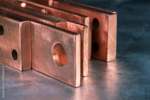 Copper flat bars, clean and polished, close-up view