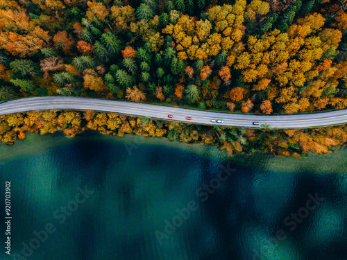Cuadro en lienzo Aerial view of coastline road with autumn fall color woods and blue lakes water in Finland