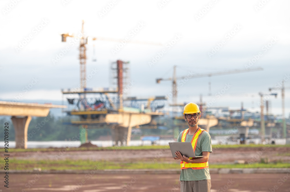 Asian engineers inspect bridge construction