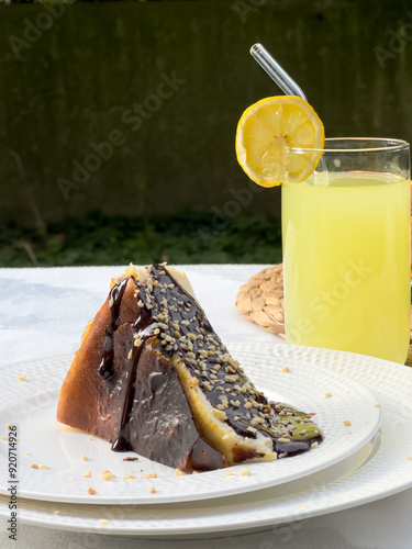 Popular Spanish cheesecake called San Sebastian cheesecake., Sliced san sebastian cheesecake with coffee on table