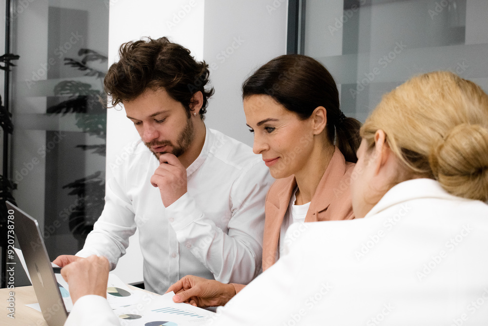 Employees participating in a brainstorming session in an office conference room. A perfect shot to illustrate a dynamic and creative work environment Employees participating in a brainstorming session in an office conference room. A perfect shot to illustrate a dynamic and creative work environment