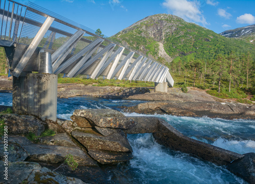 Waterfall Likholefossen on the river Saeta at the scenic route Gaularfjellet in Norway, Europe .