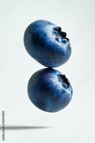 Chandler Blueberry fruit levitating on a white background photo