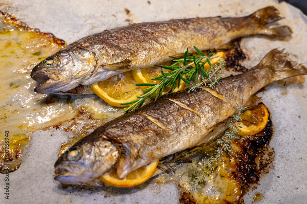 fish trout baked with lemon butter and rosemary fish trout baked with lemon butter and rosemary