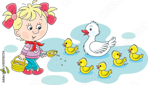 Little girl farmer standing with a bucket of feed grain and feeding a merry brood of small yellow ducklings and a cute white duck swimming in a pond in a village, vector cartoon illustration