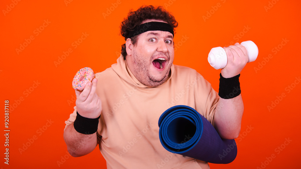 Funny fat man doing sports. Orange background. Funny fat man doing sports. Orange background.
