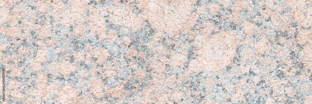 Granite texture. Natural pink granite with a grainy pattern. Stone background. Solid rough surface of rock. Durable construction and decoration material. Close-up. Granite texture. Natural pink granite with a grainy pattern. Stone background. Solid rough surface of rock. Durable construction and decoration material. Close-up.