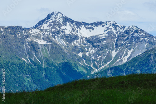 The landscape of the Alpe Lendine and the Val chiavenna, a valley of the Italian alps, near the town of Chiavenna, Italy - June 2024 photo