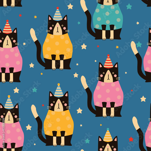 Seamless pattern of cats on blue background. 