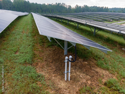 Morning Drone Images of a Large Renewable Solar Farm in Louisburg North Carolina Using Technology and Science for Green Energy & Lowering Carbon Footprints. 