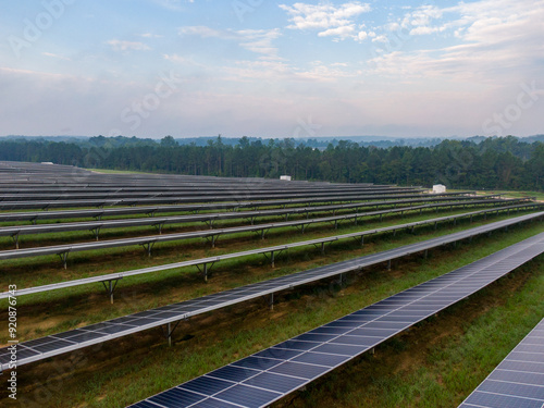 Morning Drone Images of a Large Renewable Solar Farm in Louisburg North Carolina Using Technology and Science for Green Energy & Lowering Carbon Footprints. 