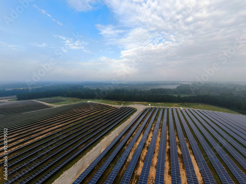 Morning Drone Images of a Large Renewable Solar Farm in Louisburg North Carolina Using Technology and Science for Green Energy & Lowering Carbon Footprints. 