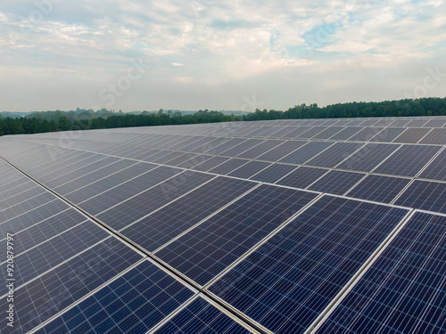 Morning Drone Images of a Large Renewable Solar Farm in Louisburg North Carolina Using Technology and Science for Green Energy & Lowering Carbon Footprints. 