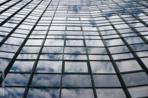 Blue glass background. Office buildind texture. Glass skyscraper background. Glass window construction. Business building pattern. Futuristic architecture. Downtown city center high building. photo