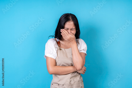 Women are doing various poses on a blue background.