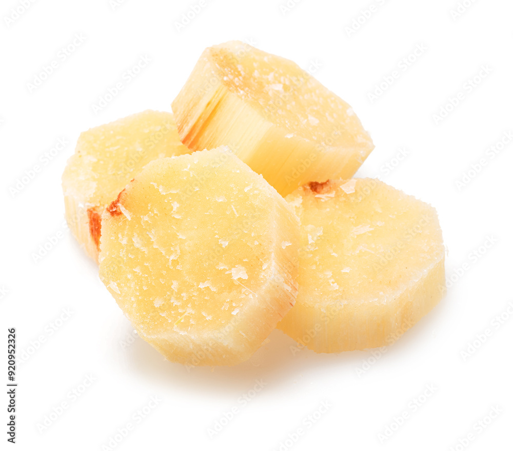 Peeled sugarcane cuts or rounds isolated on white background. Peeled sugarcane cuts or rounds isolated on white background.