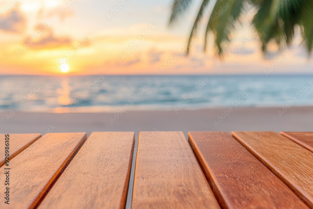 Wooden table with a beautiful view of a sunset over a tropical beach, palm leaves in the background, perfect for a relaxing getaway scene. Wooden table with a beautiful view of a sunset over a tropical beach, palm leaves in the background, perfect for a relaxing getaway scene.