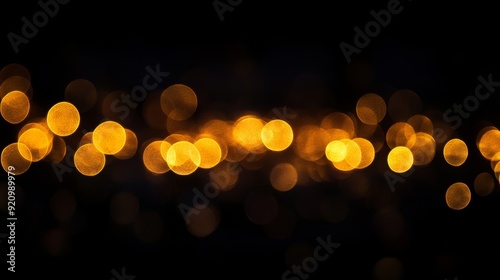 Blurred golden bokeh on black background