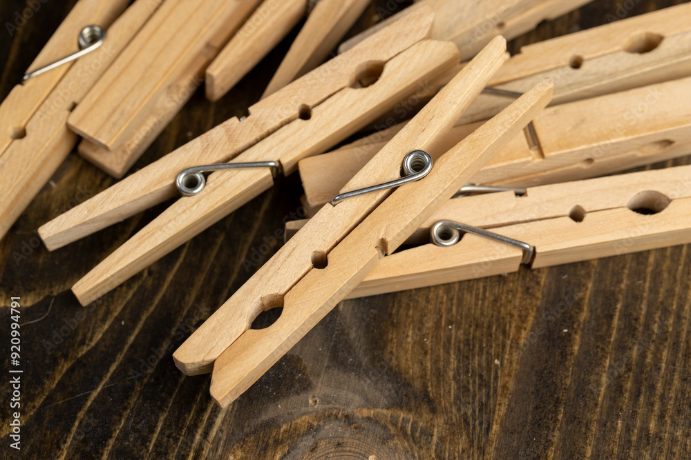 a group of wooden clothespins for drying clothes a group of wooden clothespins for drying clothes