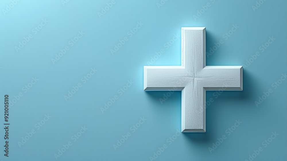 A white medical cross symbol on a soft blue gradient background A white medical cross symbol on a soft blue gradient background