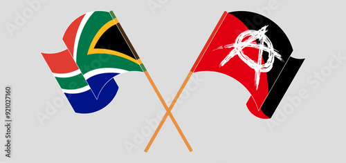 Crossed and waving flags of South Africa and Anarchy