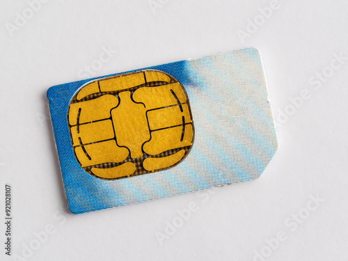 close up of a telecommunications smart phone sim card isolated on a white background photo