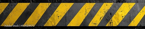 Yellow and black striped caution tape. Warning sign for danger or construction. Industrial safety.