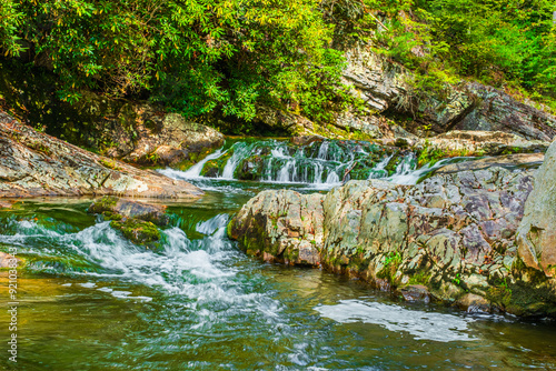 Gurgling water slides over several tiers of cascades in Paint Creek RA in Tennessee. photo